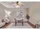 Cozy office with neutral tones, comfortable seating, and a bright workspace at 4086 E County Down Dr, Chandler, AZ 85249