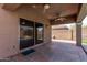 Covered patio with decorative concrete and ceiling fans at 4086 E County Down Dr, Chandler, AZ 85249