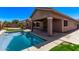 Backyard with a pool and covered patio at 4086 E County Down Dr, Chandler, AZ 85249