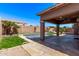 Backyard with a pool and covered patio at 4086 E County Down Dr, Chandler, AZ 85249