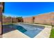 Backyard with a pool and privacy wall at 4086 E County Down Dr, Chandler, AZ 85249