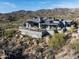 Luxury hilltop home offering stunning views, modern architecture, and private outdoor spaces at 41248 N 96Th St, Scottsdale, AZ 85262