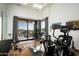 Well-equipped exercise room with desert views, offering a bright and inspiring workout space at 41248 N 96Th St, Scottsdale, AZ 85262