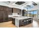 Spacious kitchen with a large island, modern appliances, and plenty of cabinet storage at 41248 N 96Th St, Scottsdale, AZ 85262