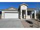 Inviting single-story home with a two-car garage and stylish stone veneer accents at 5009 S 106Th Ave, Tolleson, AZ 85353