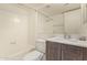 Bathroom featuring a bathtub and a wooden vanity at 7494 E Earll Dr # 308, Scottsdale, AZ 85251