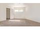 Bright bedroom with carpet, a window for natural light and closet at 7494 E Earll Dr # 308, Scottsdale, AZ 85251
