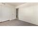 This bedroom offers neutral carpet and paint plus a closet with sliding doors at 7494 E Earll Dr # 308, Scottsdale, AZ 85251