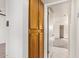 Hallway view leading to a bedroom and featuring a wooden cabinet at 7494 E Earll Dr # 308, Scottsdale, AZ 85251