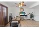 Bright dining space with tile flooring, a ceiling fan, and adjacent access to the kitchen at 8410 N 32Nd Ave, Phoenix, AZ 85051