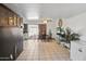 Open concept dining and living area with tile flooring and sliding door to patio at 8410 N 32Nd Ave, Phoenix, AZ 85051