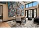 Modern dining room boasting high ceilings, stylish decor, and ample natural light, perfect for entertaining guests at 9643 E Cintarosa Pass, Scottsdale, AZ 85262