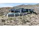 Modern home with pool boasts stunning desert mountain views and inviting outdoor living spaces at 9643 E Cintarosa Pass, Scottsdale, AZ 85262