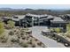 Striking modern home with desert views, lush desert landscaping and gated entry at 9643 E Cintarosa Pass, Scottsdale, AZ 85262