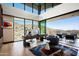 Bright office with a modern desk, comfortable seating and scenic mountain views at 9643 E Cintarosa Pass, Scottsdale, AZ 85262