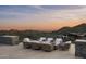 Outdoor seating area with fire pit and desert views at 9643 E Cintarosa Pass, Scottsdale, AZ 85262