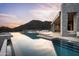 Outdoor pool featuring a fire feature and unobstructed mountain views at 9643 E Cintarosa Pass, Scottsdale, AZ 85262