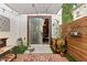 Backyard patio with outdoor potting station, brick floor, and access to indoor space at 10220 E Isleta Ave, Mesa, AZ 85209