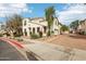 Well-kept two-story home featuring an attached garage and tidy landscaping in a community setting at 10220 E Isleta Ave, Mesa, AZ 85209