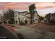 Beautiful two-story home with desert landscaping, brick driveway, and an American flag at 10220 E Isleta Ave, Mesa, AZ 85209