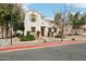 Attractive two-story home boasting a tidy, landscaped front yard and inviting entryway at 10220 E Isleta Ave, Mesa, AZ 85209