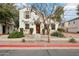 Charming two-story home with inviting curb appeal and a well-maintained front yard at 10220 E Isleta Ave, Mesa, AZ 85209