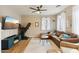 Cozy living room featuring modern furniture, wood floors and lots of natural light at 10220 E Isleta Ave, Mesa, AZ 85209
