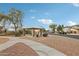 Community pavilion with stone pillars, picnic tables, and a nearby sidewalk on a sunny day at 10220 E Isleta Ave, Mesa, AZ 85209