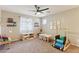 Spacious playroom featuring neutral paint, ample lighting, and versatile setup for fun and creativity at 10220 E Isleta Ave, Mesa, AZ 85209