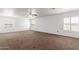Spacious bedroom featuring neutral walls and plush carpeting for maximum comfort at 11856 W Grant St, Avondale, AZ 85323