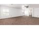 Bright bedroom with large windows and neutral tones, perfect for relaxation at 11856 W Grant St, Avondale, AZ 85323