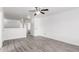 Bright living room with neutral walls and modern light gray flooring at 11856 W Grant St, Avondale, AZ 85323