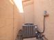 Exterior shot of the home's air conditioning unit, surrounded by rock landscaping at 12244 N Tower Dr, Fountain Hills, AZ 85268