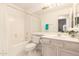 Clean bathroom with tub, shower, and vanity with a large mirror at 12244 N Tower Dr, Fountain Hills, AZ 85268