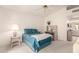 Inviting bedroom with blue bedding, white walls, and ample natural light at 12244 N Tower Dr, Fountain Hills, AZ 85268