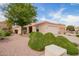 Charming single story home featuring a terra cotta roof and lush landscaping at 12244 N Tower Dr, Fountain Hills, AZ 85268