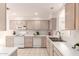 Well-maintained kitchen with white appliances, ample counter space, and neutral-toned cabinetry at 12244 N Tower Dr, Fountain Hills, AZ 85268