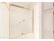 Clean tiled shower with a glass door and convenient grab bar at 12244 N Tower Dr, Fountain Hills, AZ 85268