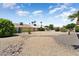 Serene backyard featuring low-maintenance desert landscaping and a private outdoor setting at 12943 W Maplewood Dr, Sun City West, AZ 85375