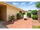 Private patio with lounge chair and lush landscaping, creating a tranquil outdoor retreat at 12943 W Maplewood Dr, Sun City West, AZ 85375