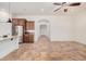 A spacious kitchen with stainless steel appliances, granite countertops, and tile floors at 13641 W Jesse Red Dr, Peoria, AZ 85383