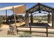 Community park featuring shaded picnic area and playground at 14467 W Sand Hills Rd, Surprise, AZ 85387