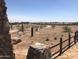 Stone framed view of a walking path in the Rancho Mercado community, framed by desert landscape at 14467 W Sand Hills Rd, Surprise, AZ 85387