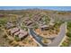 Stunning aerial view of a well-manicured community with luxurious homes and green desert landscaping at 16248 E Ridgeline Dr, Fountain Hills, AZ 85268