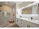 Bright bathroom featuring double sink vanity with matte black hardware and a frameless glass shower at 16248 E Ridgeline Dr, Fountain Hills, AZ 85268