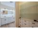 Spacious bathroom with dual vanity, open shelving, and walk-in glass shower at 16248 E Ridgeline Dr, Fountain Hills, AZ 85268