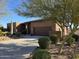 Beautiful one-story stucco home featuring desert landscaping and a spacious driveway leading to an attached two-car garage at 16248 E Ridgeline Dr, Fountain Hills, AZ 85268