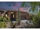 Charming desert home featuring a well-manicured yard with native cacti and a two-car garage at 16248 E Ridgeline Dr, Fountain Hills, AZ 85268