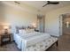 Comfortable bedroom featuring ceiling fan and ensuite bathroom at 16248 E Ridgeline Dr, Fountain Hills, AZ 85268