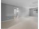 Spacious bedroom showcasing neutral walls, carpeting and window letting in natural light at 17812 W Getty Dr, Goodyear, AZ 85338
